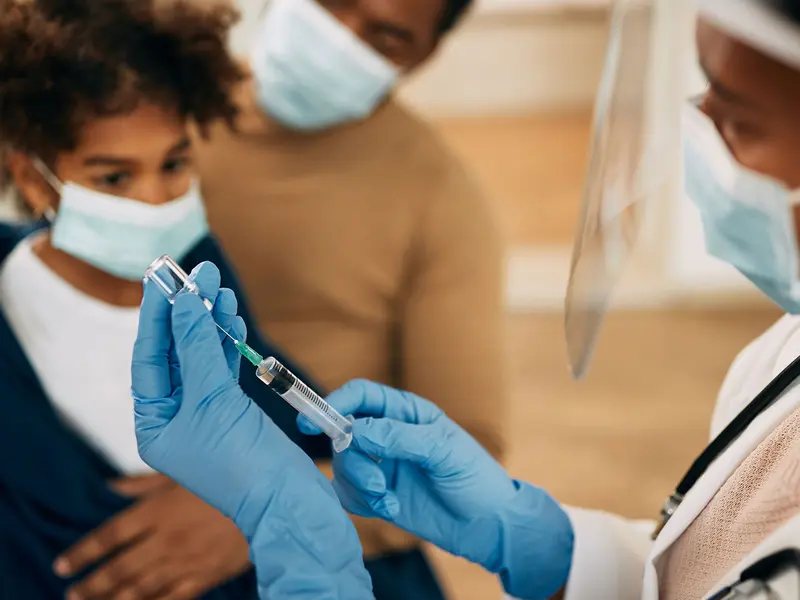 Coordinating Large-Scale Vaccination Initiatives